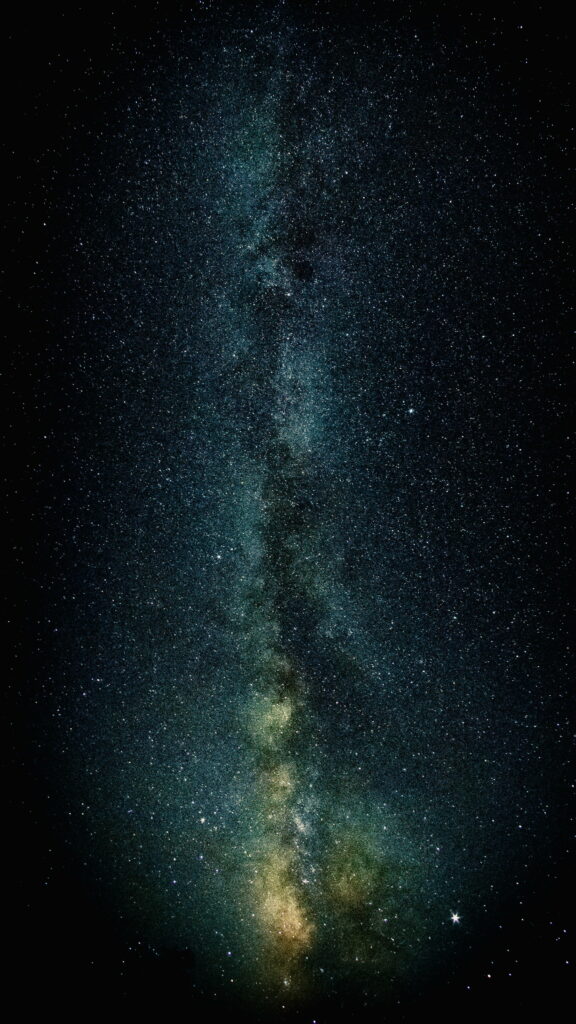 Stellar Abyss: Captivating Dark Galaxy in HD - A Mesmerizing Space-themed Phone Wallpaper