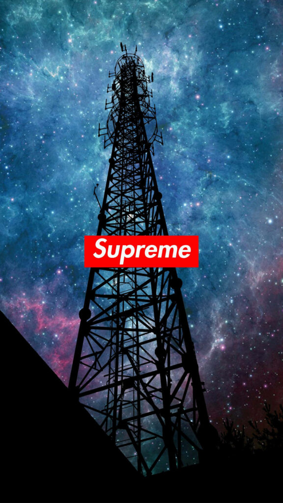 Towering Galactic Majesty: The Iconic Supreme Logo Shines in a Stellar Sky Wallpaper
