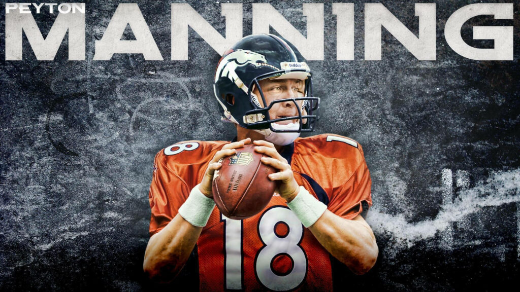 The Legendary MVP: Peyton Manning Grasping the NFL Spotlight Wallpaper
