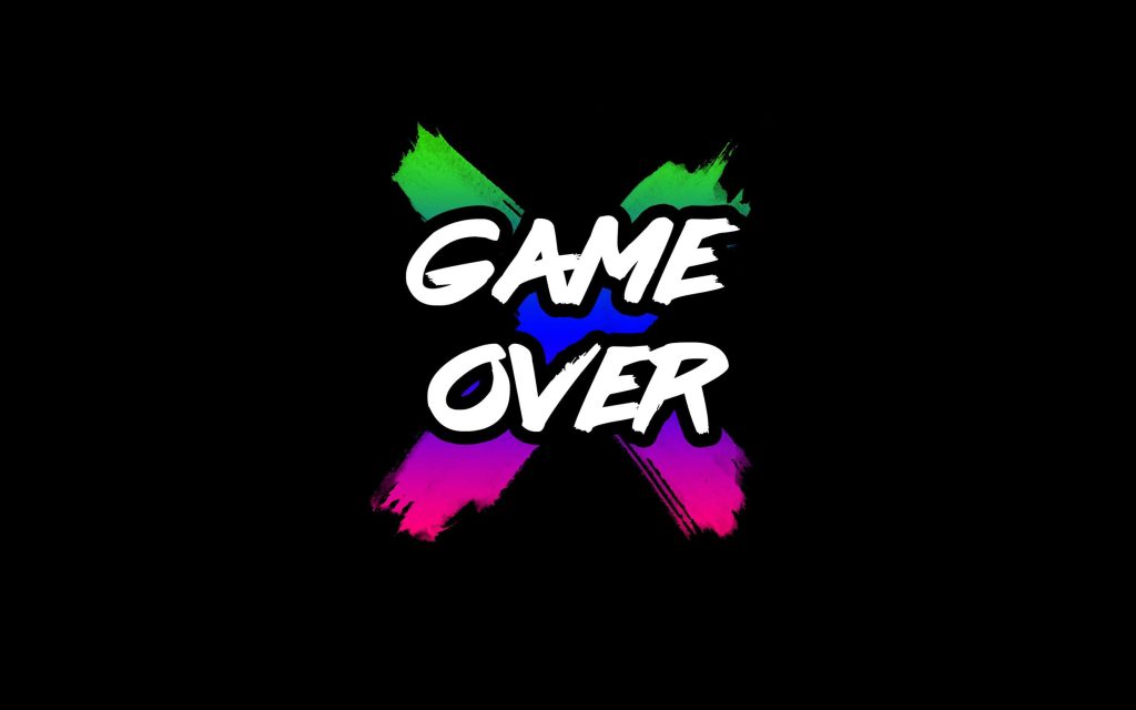 Bold digital wallpaper with white GAME OVER text over vibrant multicolor X on black background