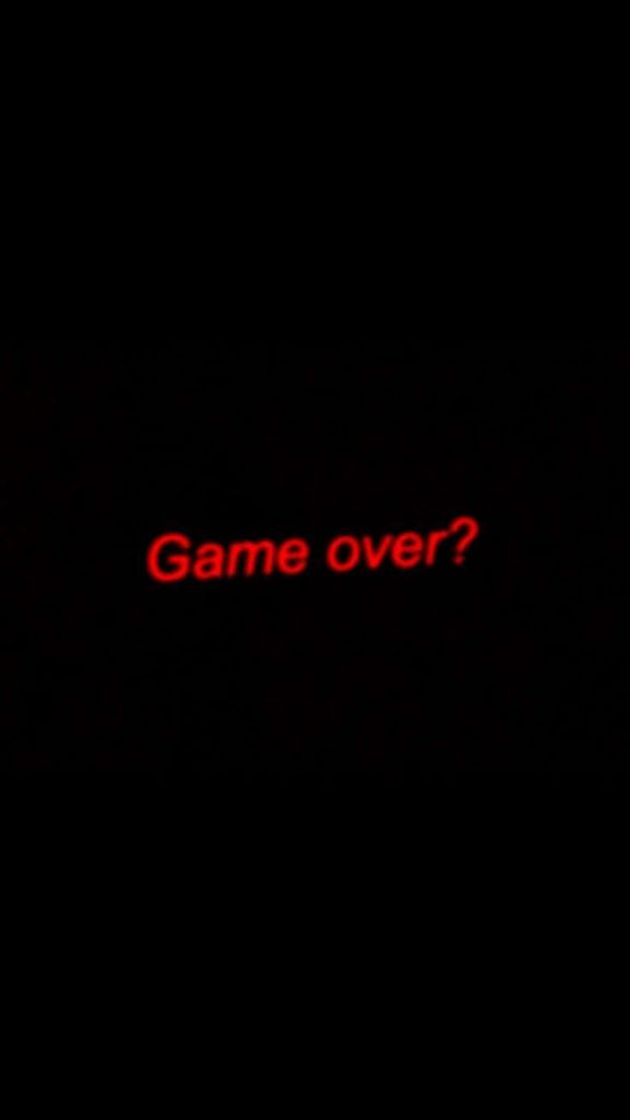 Minimalist wallpaper with glowing red Game over text on black background for dark mode design