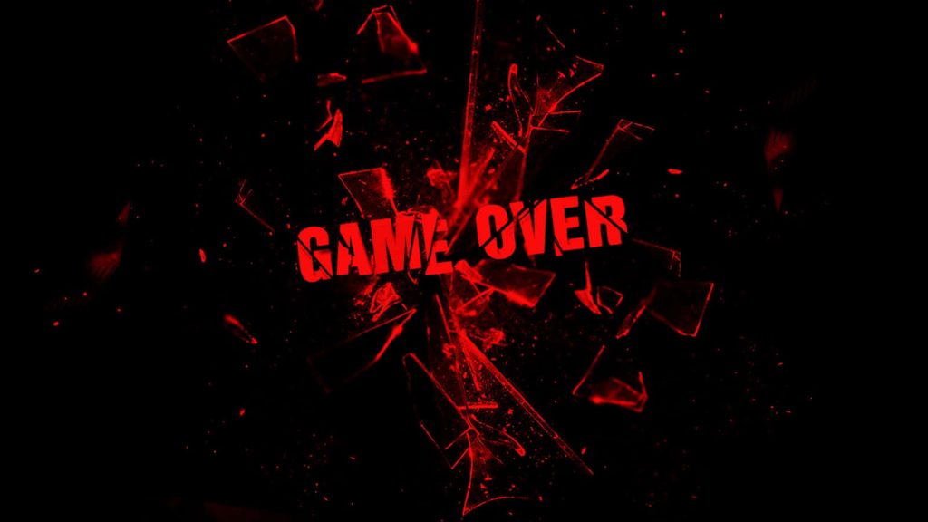 Bold red Game Over text with shattered glass effect on dark intense gaming wallpaper background
