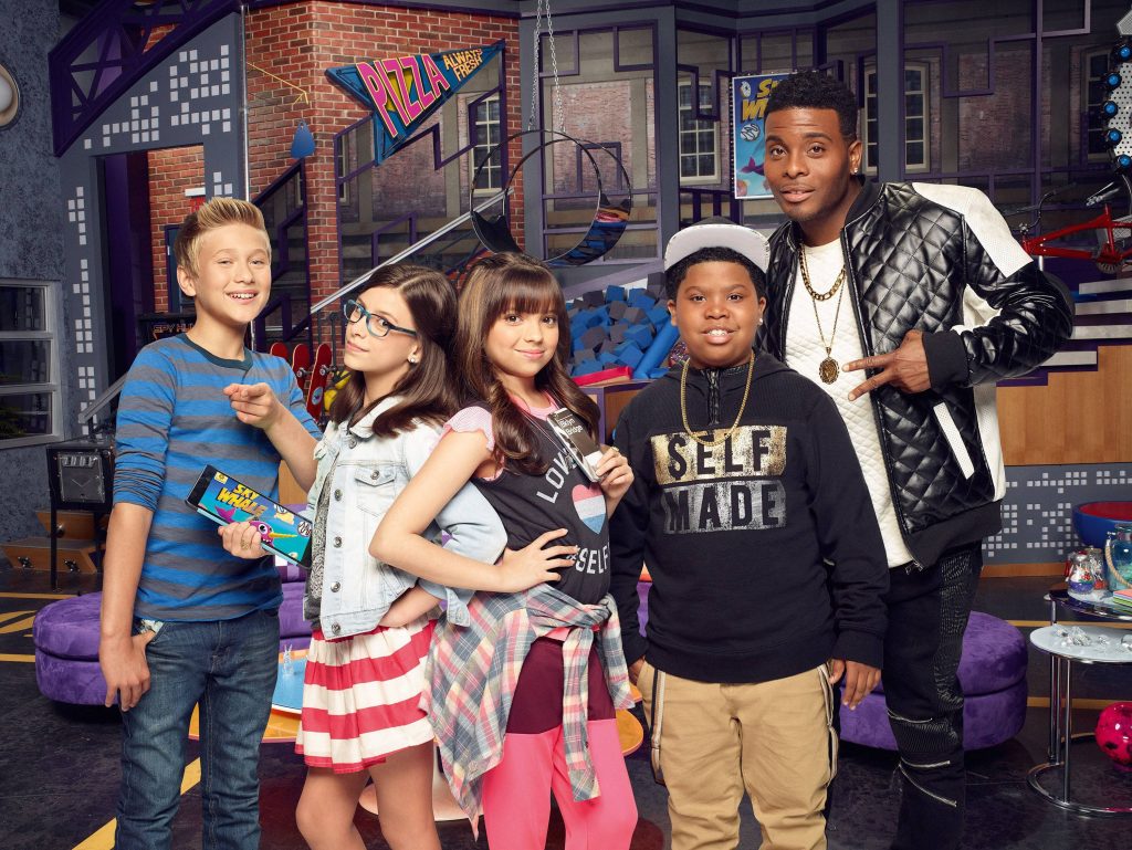 Game Shakers cast in colorful gaming studio vibrant wallpaper with Thomas Kuc Madisyn Shipman