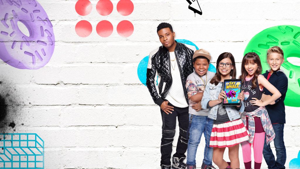 Game Shakers wallpaper with Kel Mitchell and cast colorful pop art white brick background