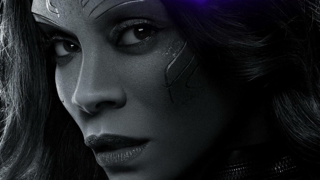 Greyscale close-up of Zoe Saldana as Gamora intense expression detailed facial markings wallpaper