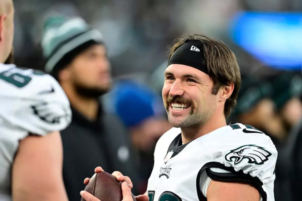 Gardner Minshew II in white Eagles jersey smiling with headband during game action wallpaper