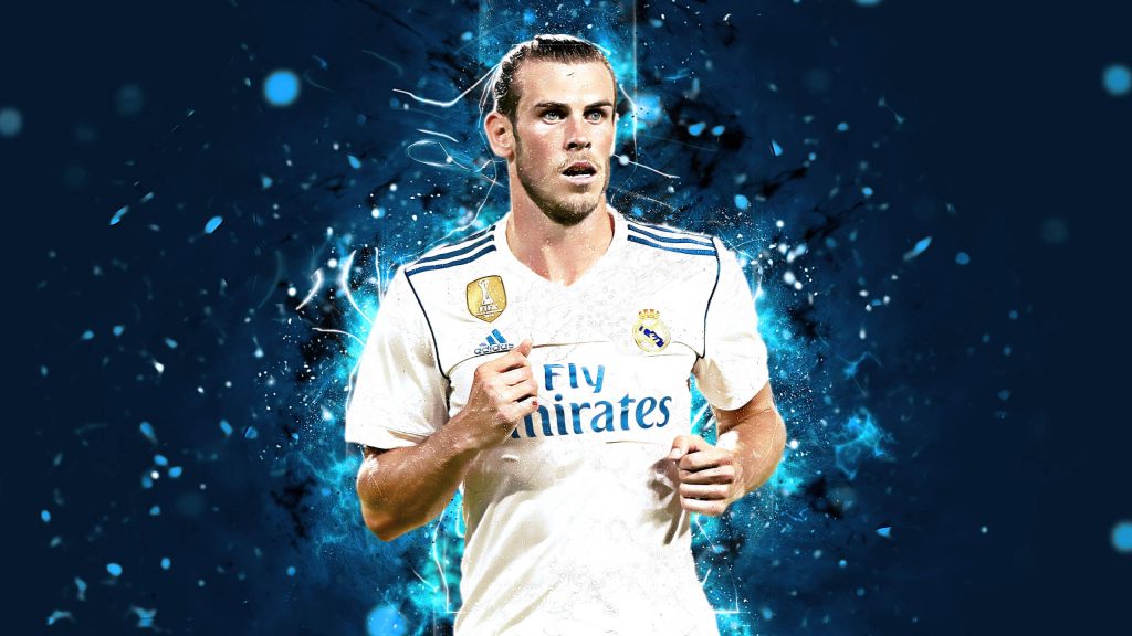 Gareth Bale Real Madrid wallpaper with focused pose on electric dark blue abstract background
