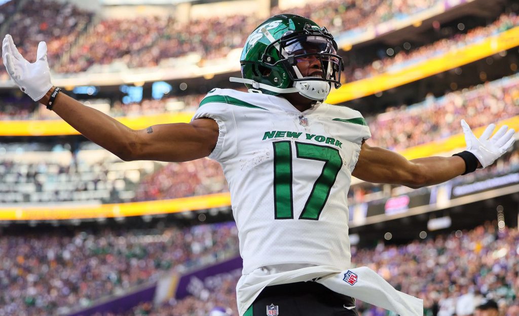 Garrett Wilson New York Jets touchdown celebration in white jersey stadium crowd wallpaper