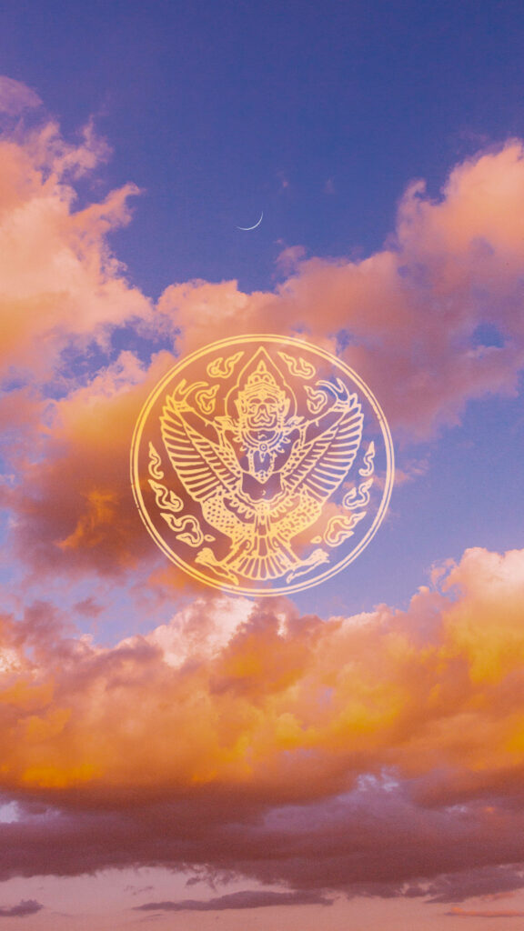 Elegant Garuda Emblem Wallpaper: Serene Twilight Sky Design