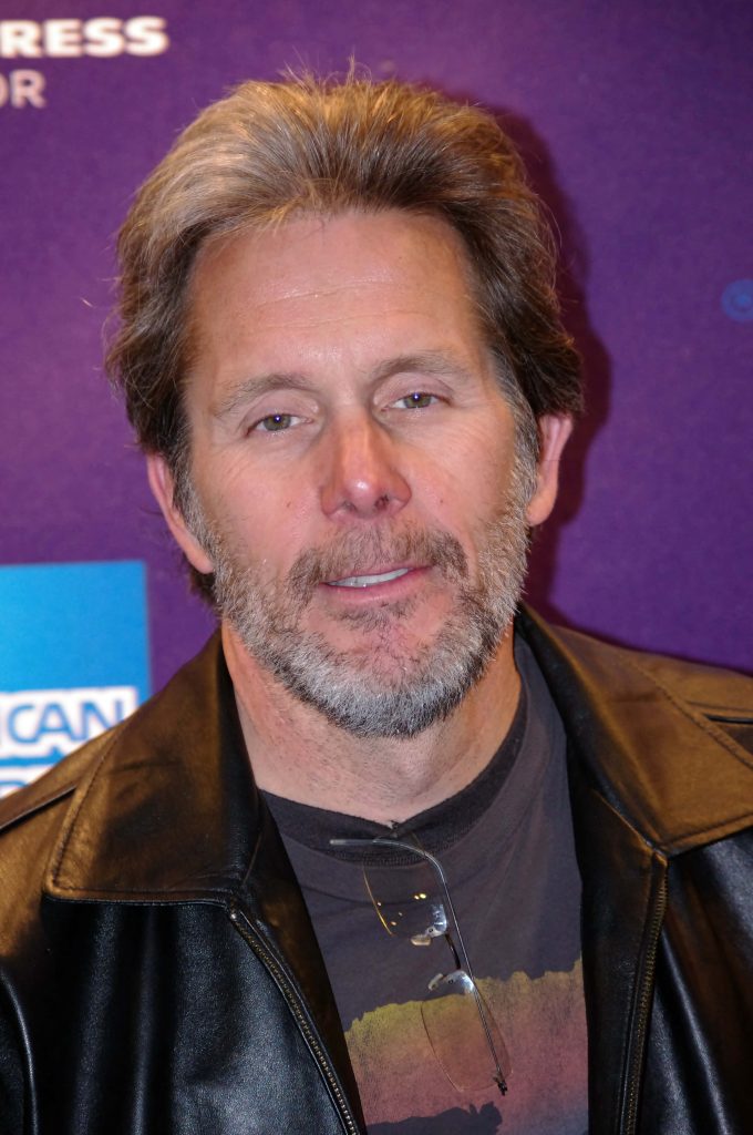 Gary Cole portrait in black leather jacket vibrant purple event background HD wallpaper