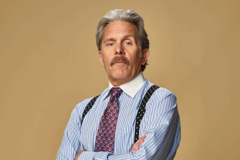 Gary Cole professional studio portrait stern expression blue striped shirt red tie black suspenders Wallpaper