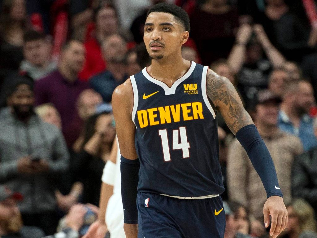 Gary Harris Denver Nuggets NBA player intense action portrait in navy uniform number 14 wallpaper