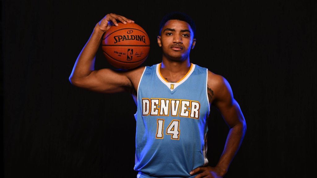 Gary Harris Denver Nuggets jersey 14 holding basketball dramatic dark background sports wallpaper