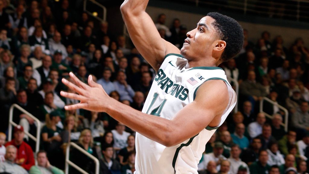Gary Harris in white Michigan State Spartans jersey basketball action wallpaper background