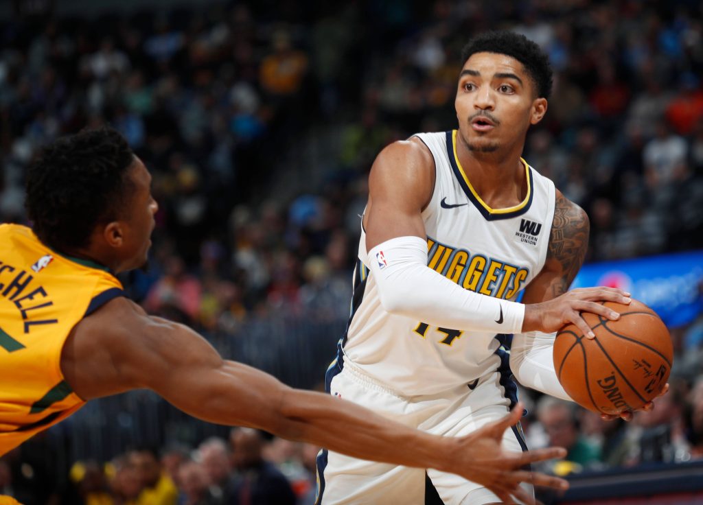 Denver Nuggets Gary Harris guarded by Utah Jazz Donovan Mitchell intense NBA action wallpaper