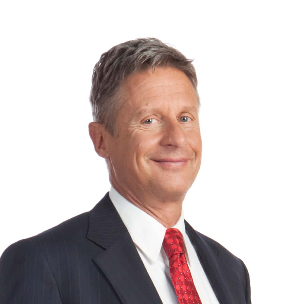 Former Governor Gary Johnson portrait smiling in pinstripe suit and red tie on white background Wallpaper