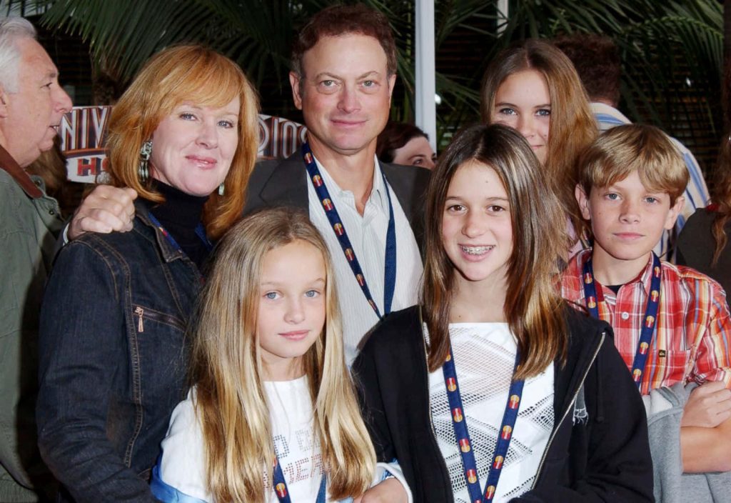 Gary Sinise family portrait smiling with wife Moira Harris and children at public event wallpaper