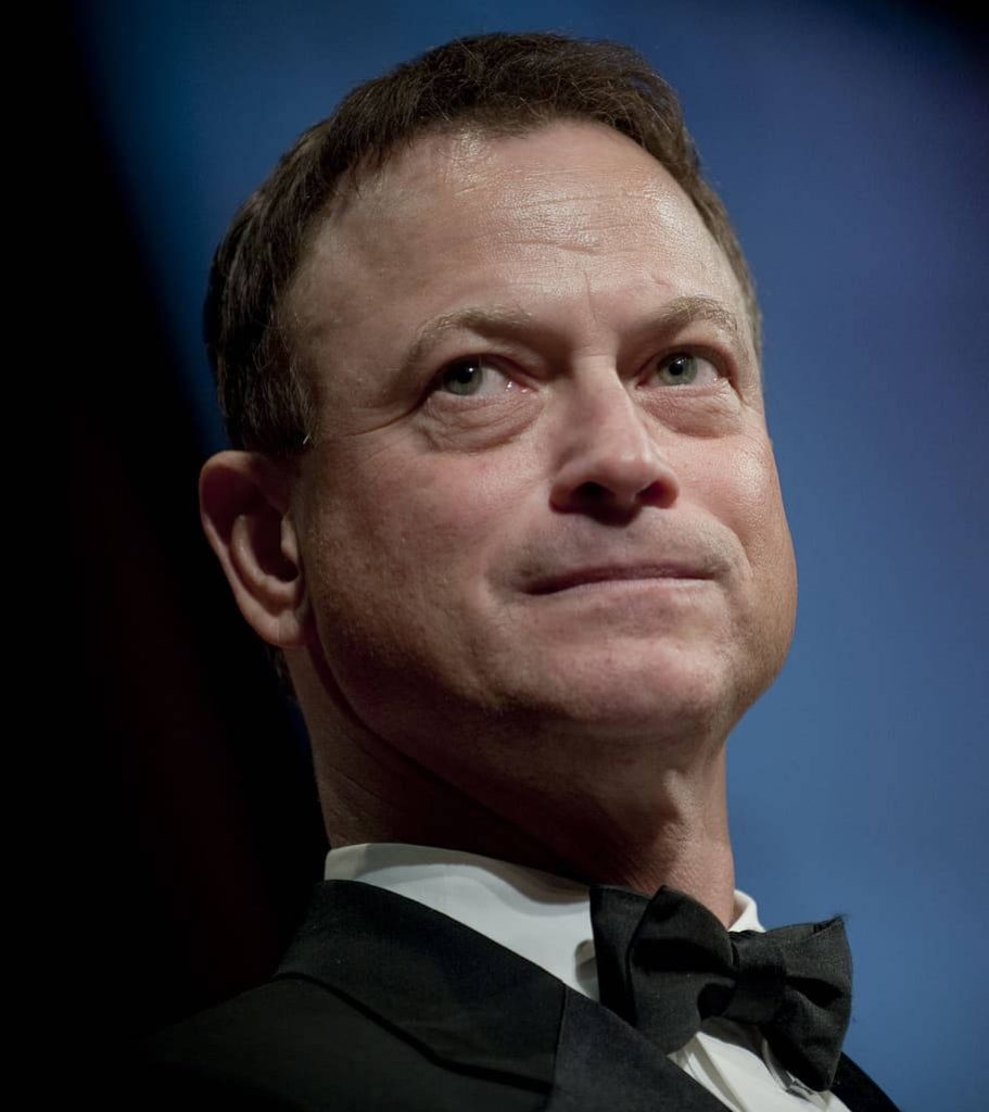 Gary Sinise professional portrait in tuxedo with bow tie soft dramatic lighting dark blue background Wallpaper