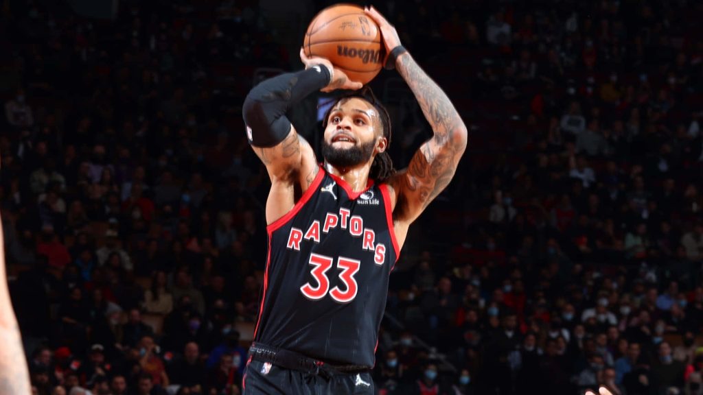Gary Trent Jr jump shot Toronto Raptors black jersey vs New York Knicks intense NBA game wallpaper