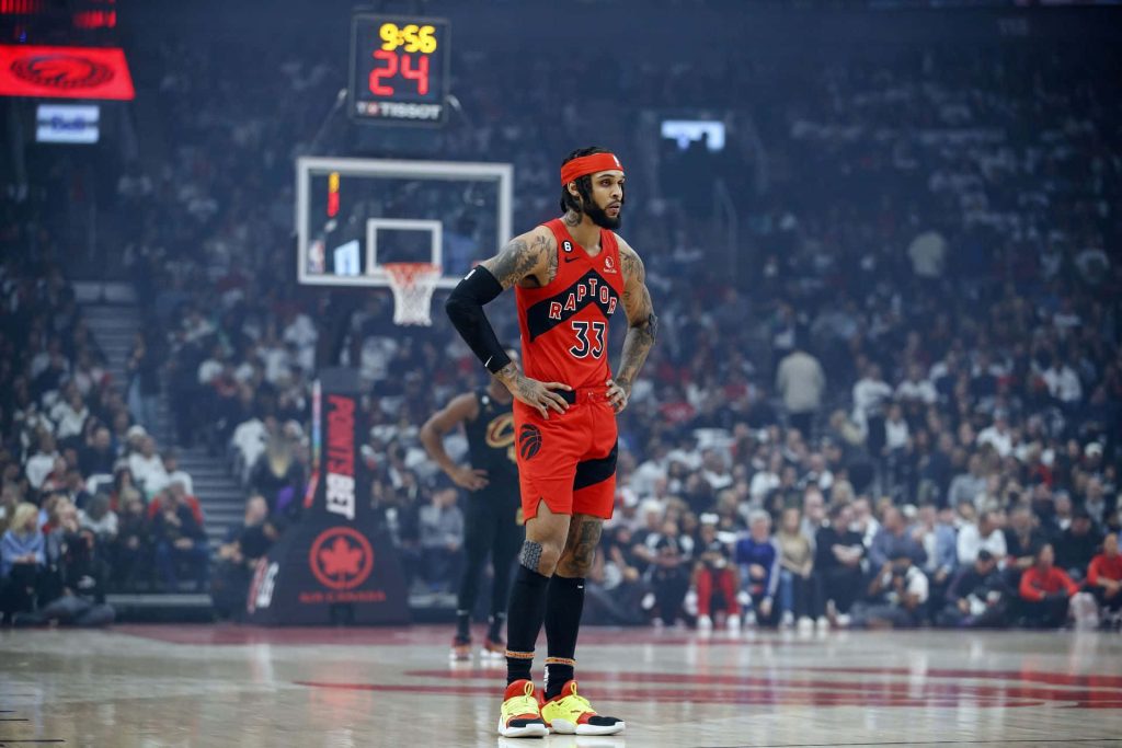 Gary Trent Jr Toronto Raptors jersey 33 focused on court intense game vs Cleveland Cavaliers Wallpaper