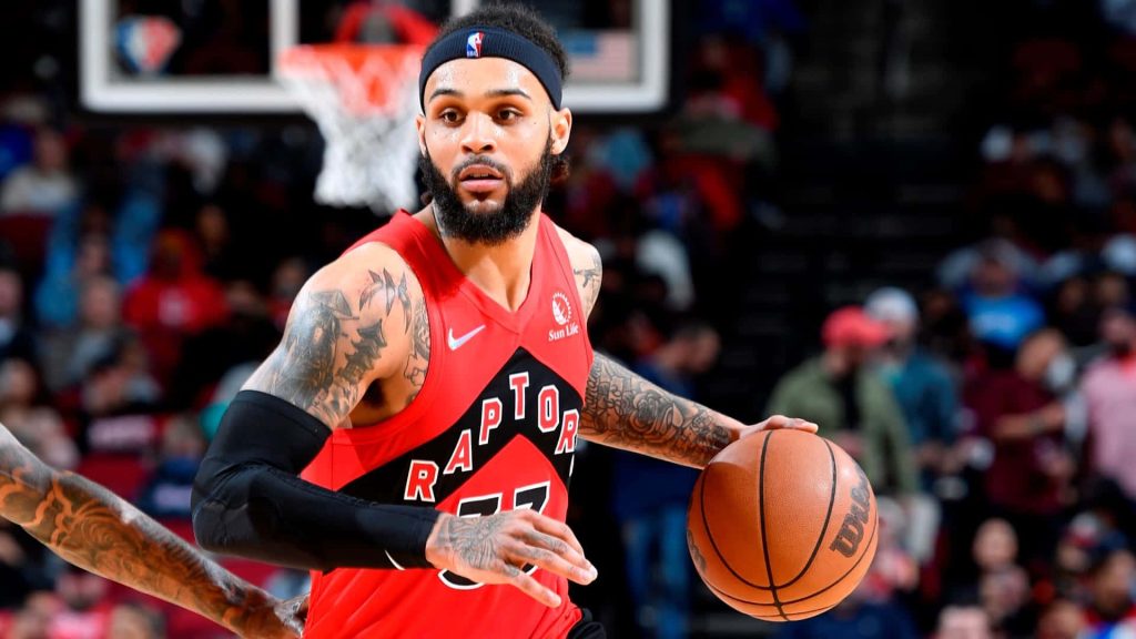 Gary Trent Jr. dribbling in red Toronto Raptors jersey vibrant NBA action wallpaper background