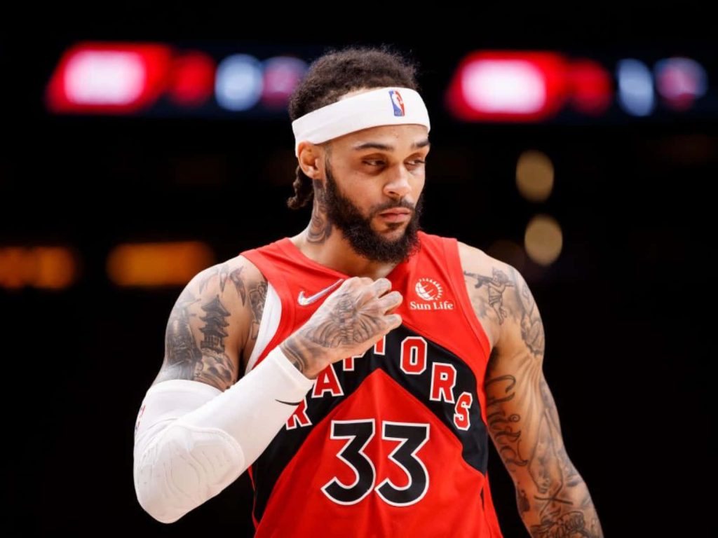 Toronto Raptors Gary Trent Jr in red jersey and headband high-quality sports wallpaper background