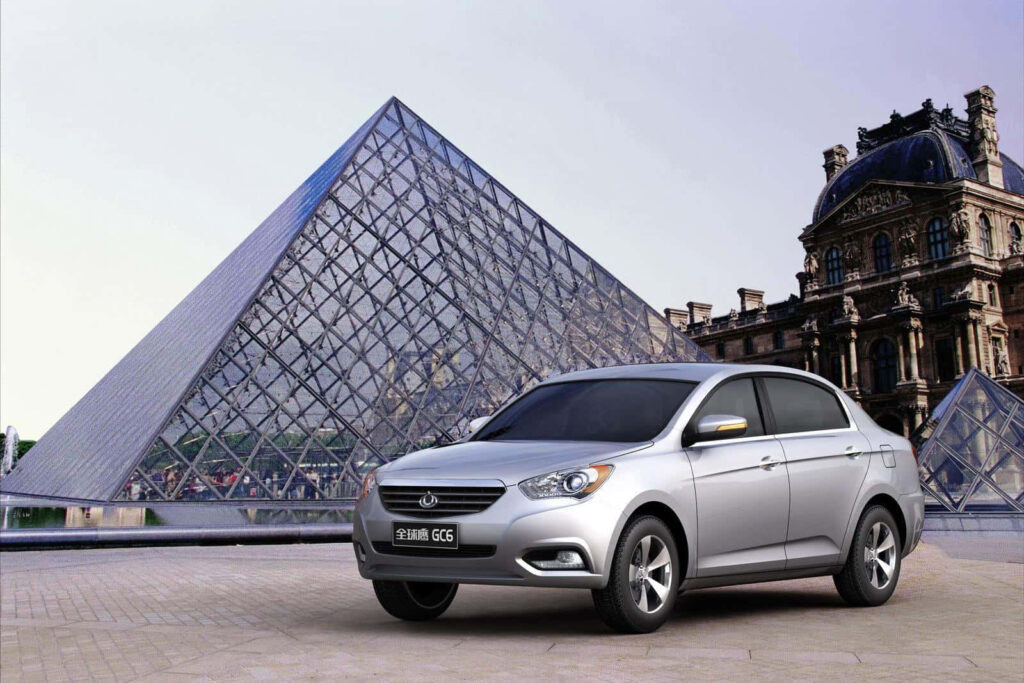 Geely Sedan at Louvre: Modern Design Meets Classic Elegance Wallpaper