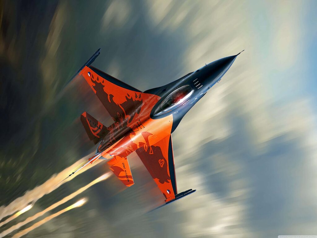 General Dynamics F-16 Fighting Falcon with bold orange black livery soaring in sky high detail wallpaper