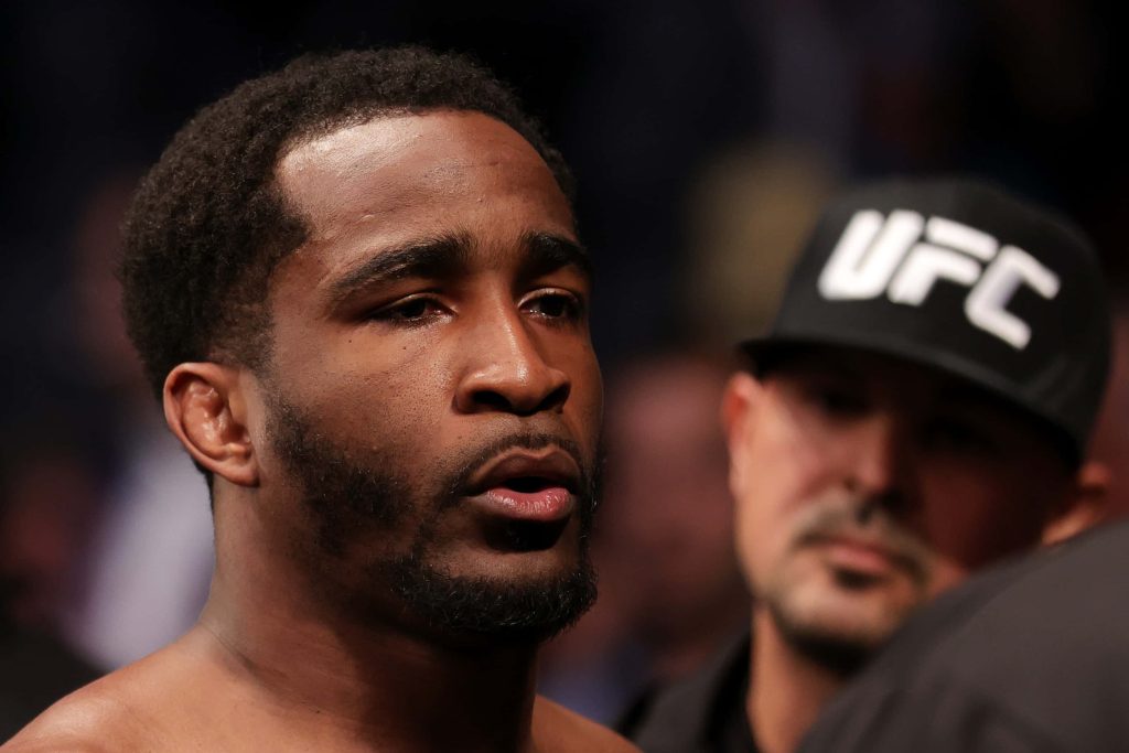 Geoff Neal UFC fighter close-up intense MMA Octagon fight moody lighting official background wallpaper