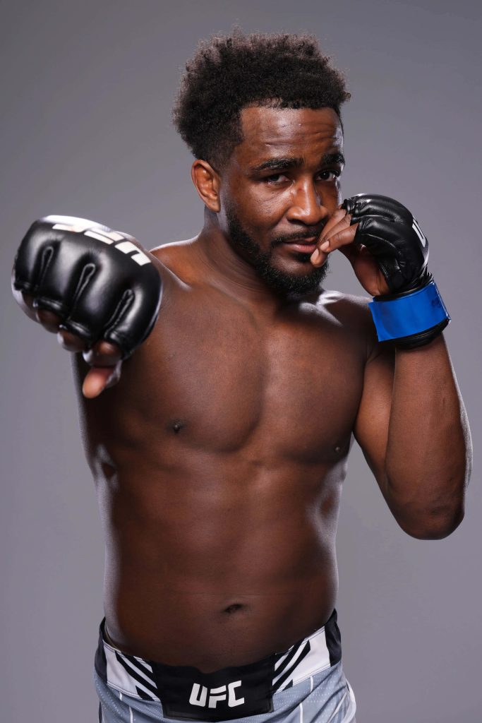 Geoff Neal UFC portrait wallpaper shirtless fighter black gloves focused athletic stance