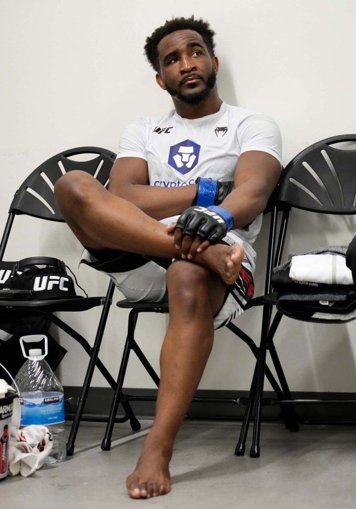 Geoff Neal UFC fighter calm focus in Venum gear locker room high-resolution sports wallpaper