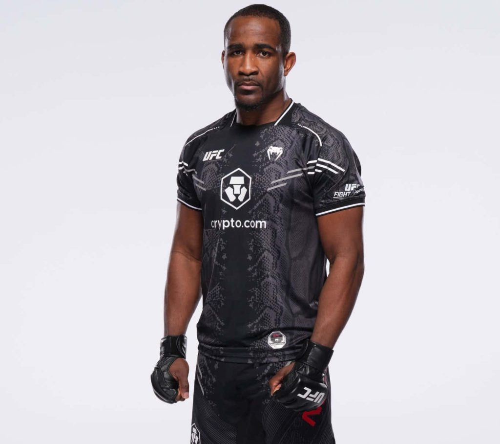 UFC welterweight Geoff Neal in black Venum gear and MMA gloves sharp studio portrait white background Wallpaper