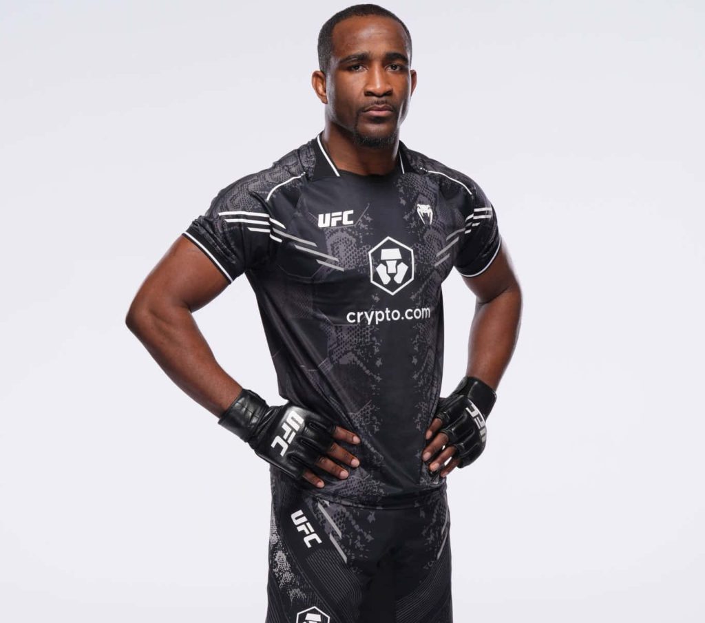 UFC welterweight Geoff Neal in black Venum fight kit posing confidently on white background Wallpaper