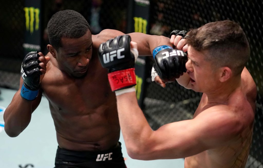 Geoff Neal and Stephen Wonderboy Thompson exchange fierce strikes in intense UFC fight wallpaper