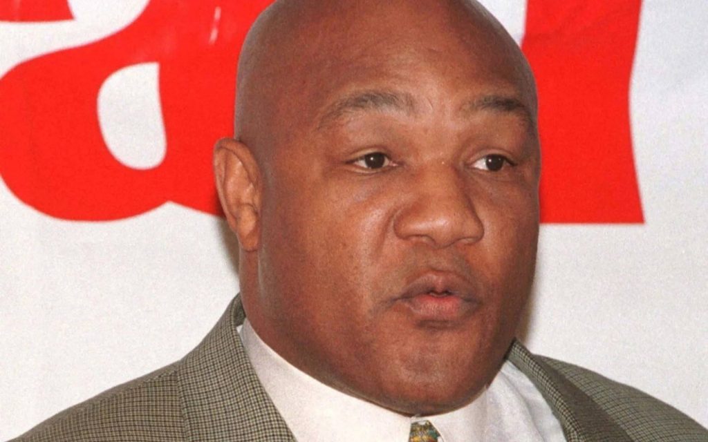 Close-up portrait of legendary heavyweight champion George Foreman with calm stoic expression Wallpaper