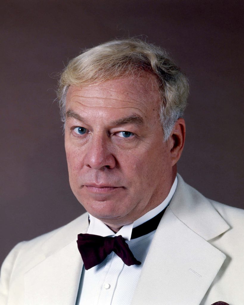 George Kennedy classic studio portrait in white dinner jacket and bow tie with soft lighting Wallpaper