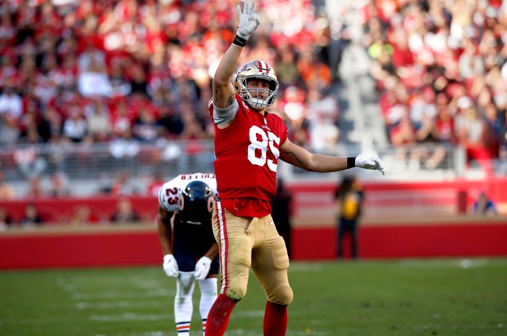 George Kittle in red 85 jersey on sunlit stadium background San Francisco 49ers wallpaper