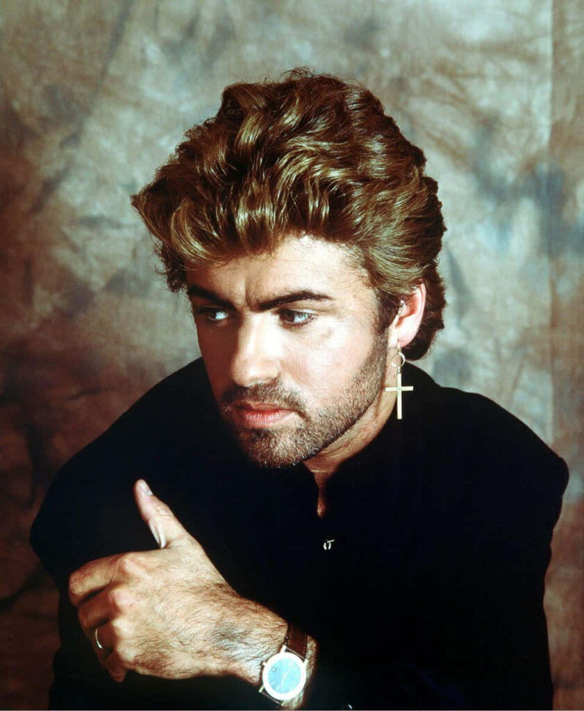George Michael Wallpaper: Iconic Style & Contemplative Pose