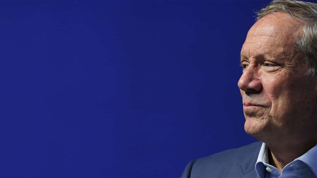 Portrait of George Pataki former New York Governor against deep blue background with soft lighting Wallpaper