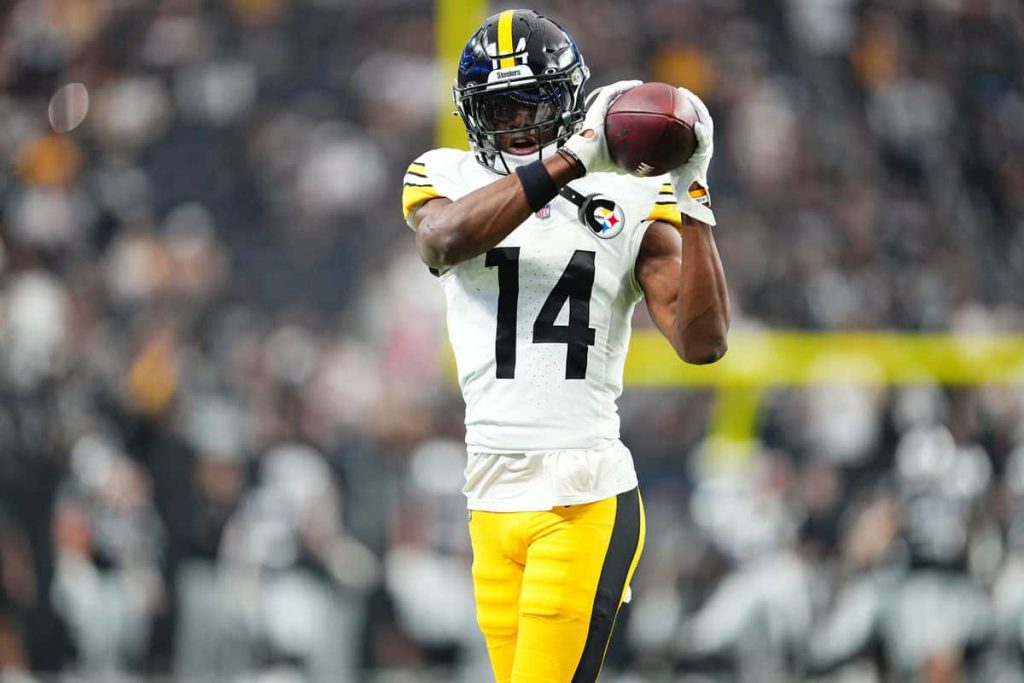 George Pickens NFL Steelers jersey 14 catching football dynamic stadium wallpaper background
