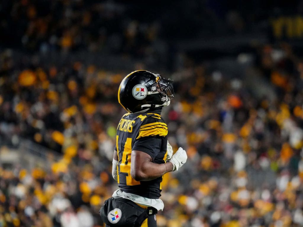 Pittsburgh Steelers wide receiver George Pickens in black and gold jersey action NFL wallpaper