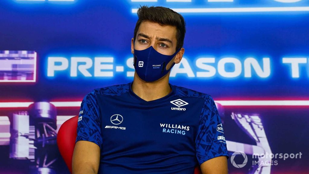 George Russell Williams Racing focused portrait blue backdrop F1 pre-season press conference Wallpaper