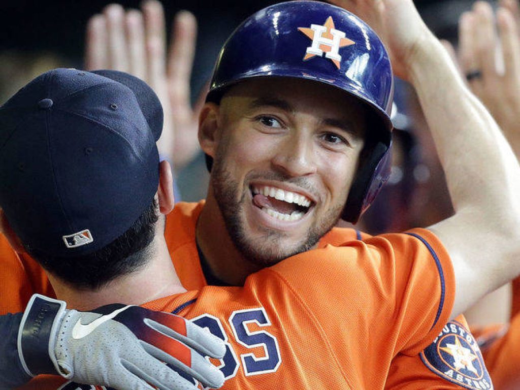 George Springer Houston Astros celebrating with teammate vibrant baseball game excitement wallpaper