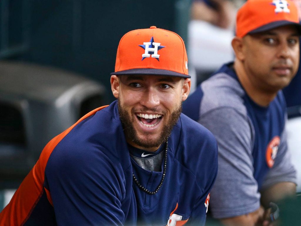 Houston Astros George Springer laughing in orange navy cap and jersey baseball wallpaper background
