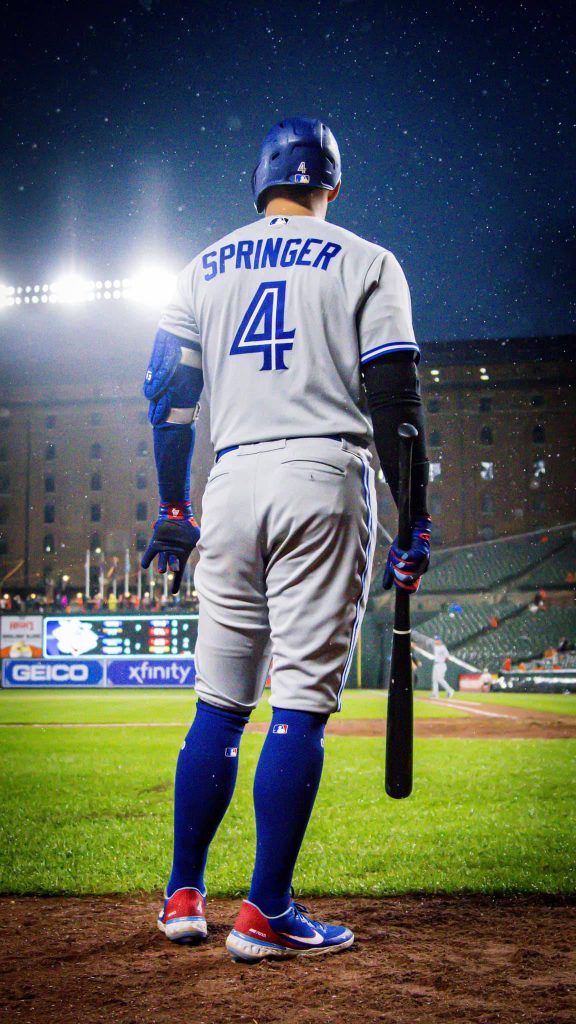 George Springer back shot wallpaper in grey Blue Jays uniform rainy stadium night high resolution