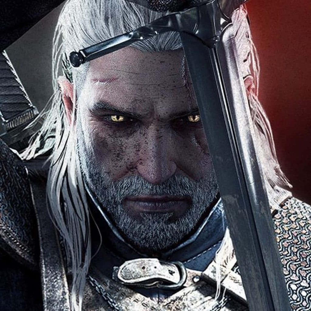 Geralt of Rivia close-up with yellow eyes and scars holding steel sword fantasy Witcher wallpaper