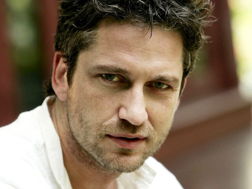Gerard Butler close-up portrait showing rugged handsome Scottish actor with confident charm Wallpaper