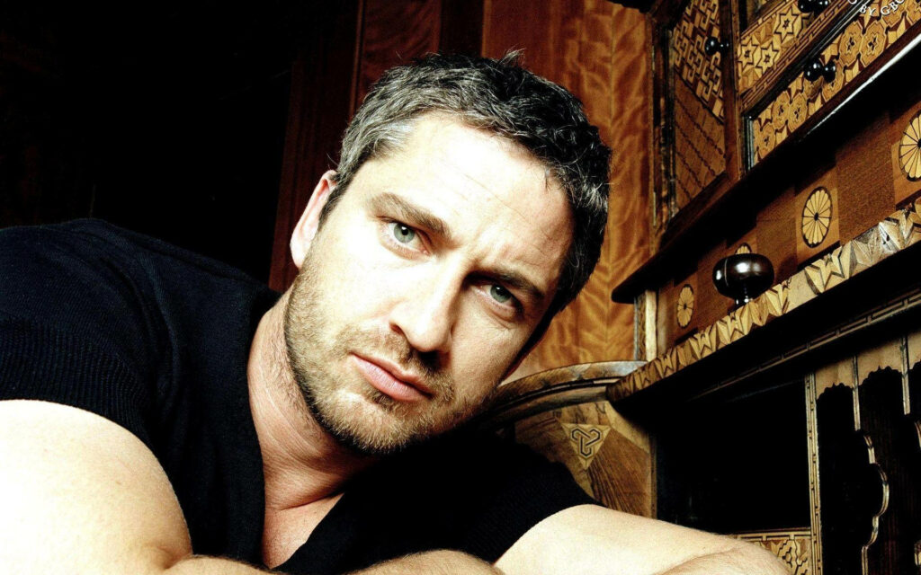 Gerard Butler intense model pose thoughtful expression intricate detailed Hollywood wallpaper background