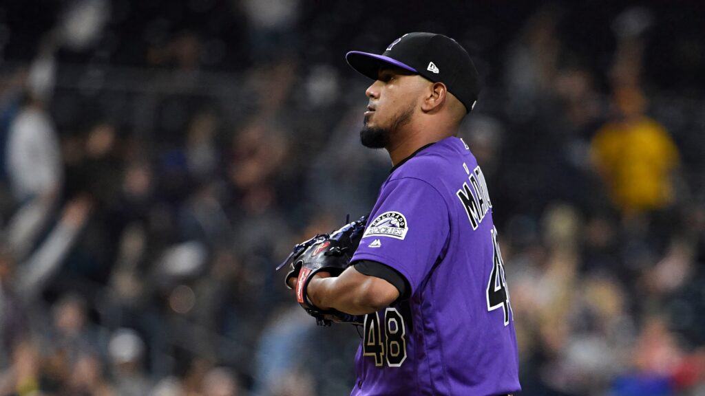 German Marquez in Colorado Rockies uniform number 48 focused side view dynamic baseball wallpaper