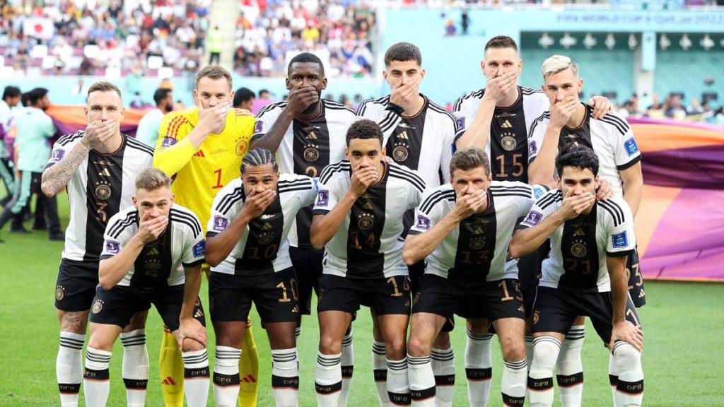 Germany 2022 World Cup team protest on pitch with Manuel Neuer high quality football wallpaper